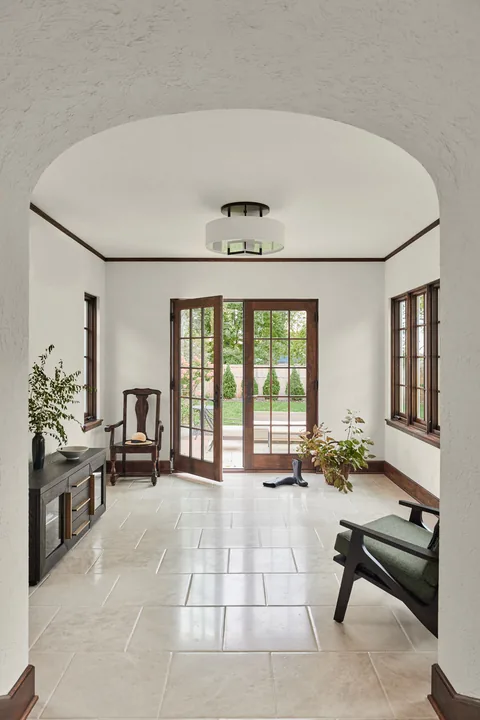 Wood-framed replacement doors and windows opening from a Georgetown, Texas entry room